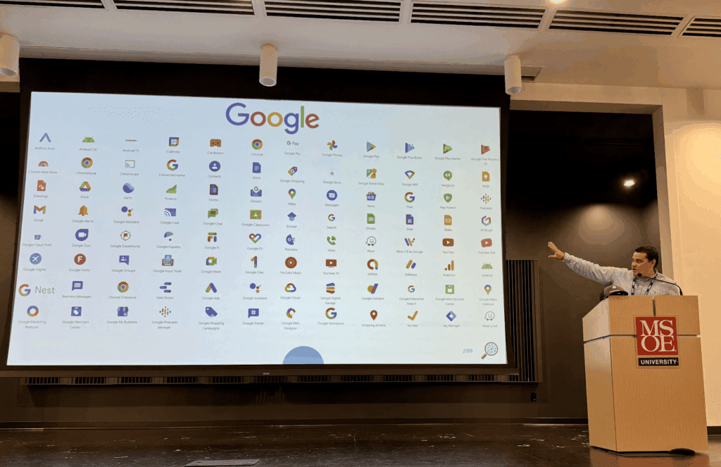 Steve Kroll at the podium reviewing all of the Google offerings and tech stack.